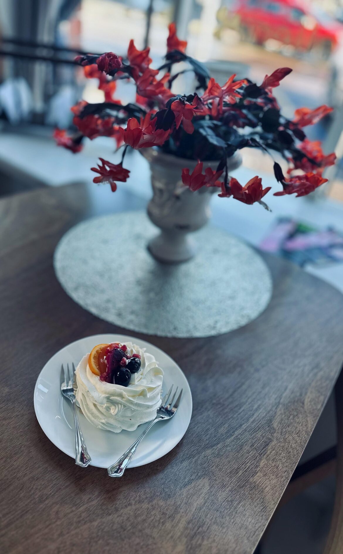 Enjoying Pavlova at local bakery/café