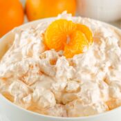 Close up of orange fluff salad made with cottage cheese, ready to be enjoyed