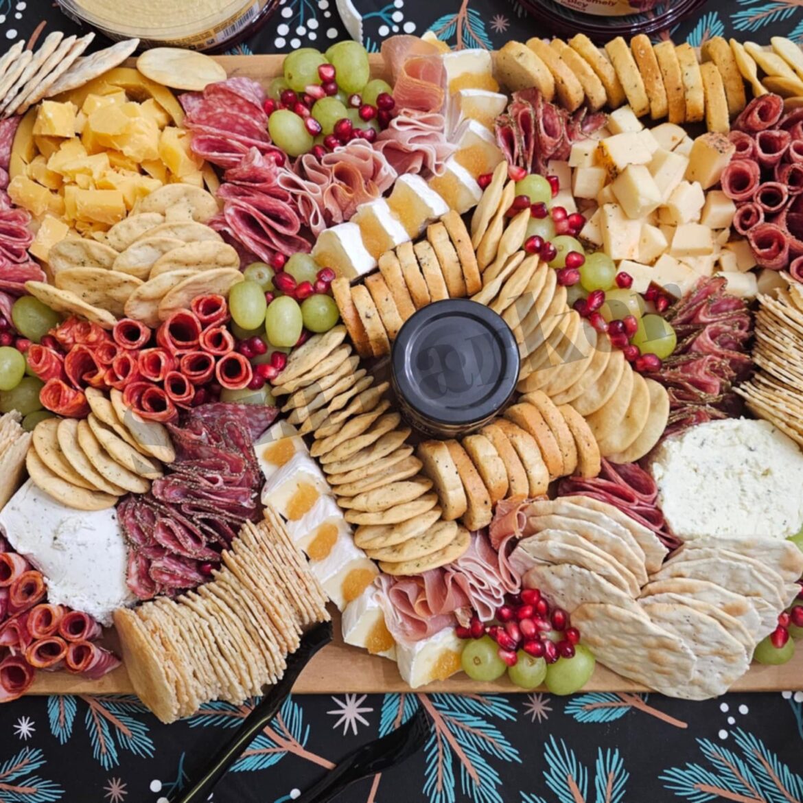 Charcuterie board for our secret Santa last year! Our friends loved it (the dip in the center is Apple & Date Balsamic jam)
