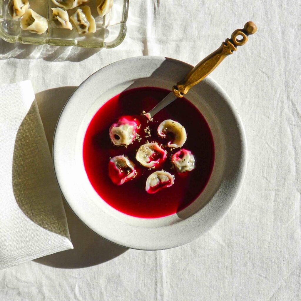 Barszcz z uszkami – Polish Christmas Eve vegan borscht made with zakwas (fermented beet juice) and served with mushroom dumplings