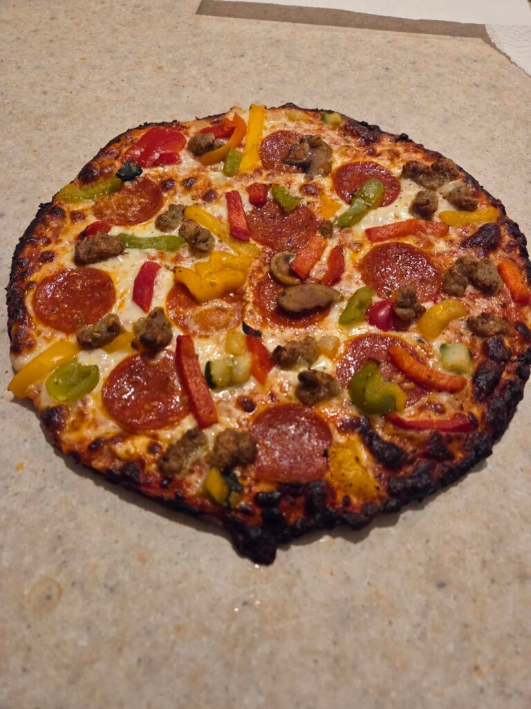 Costco cauliflower crust supreme bareass on my countertop