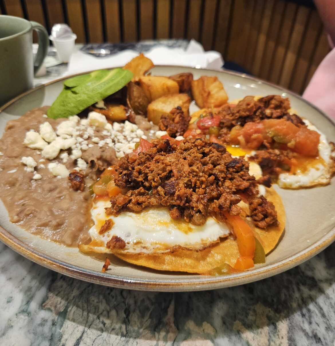 Carne asada, bean, and huevos rancheros