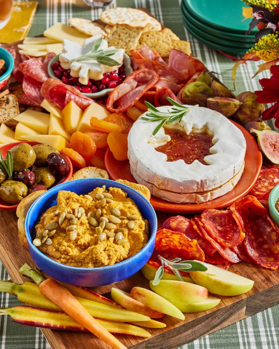thanksgiving charcuterie board with pomegranates