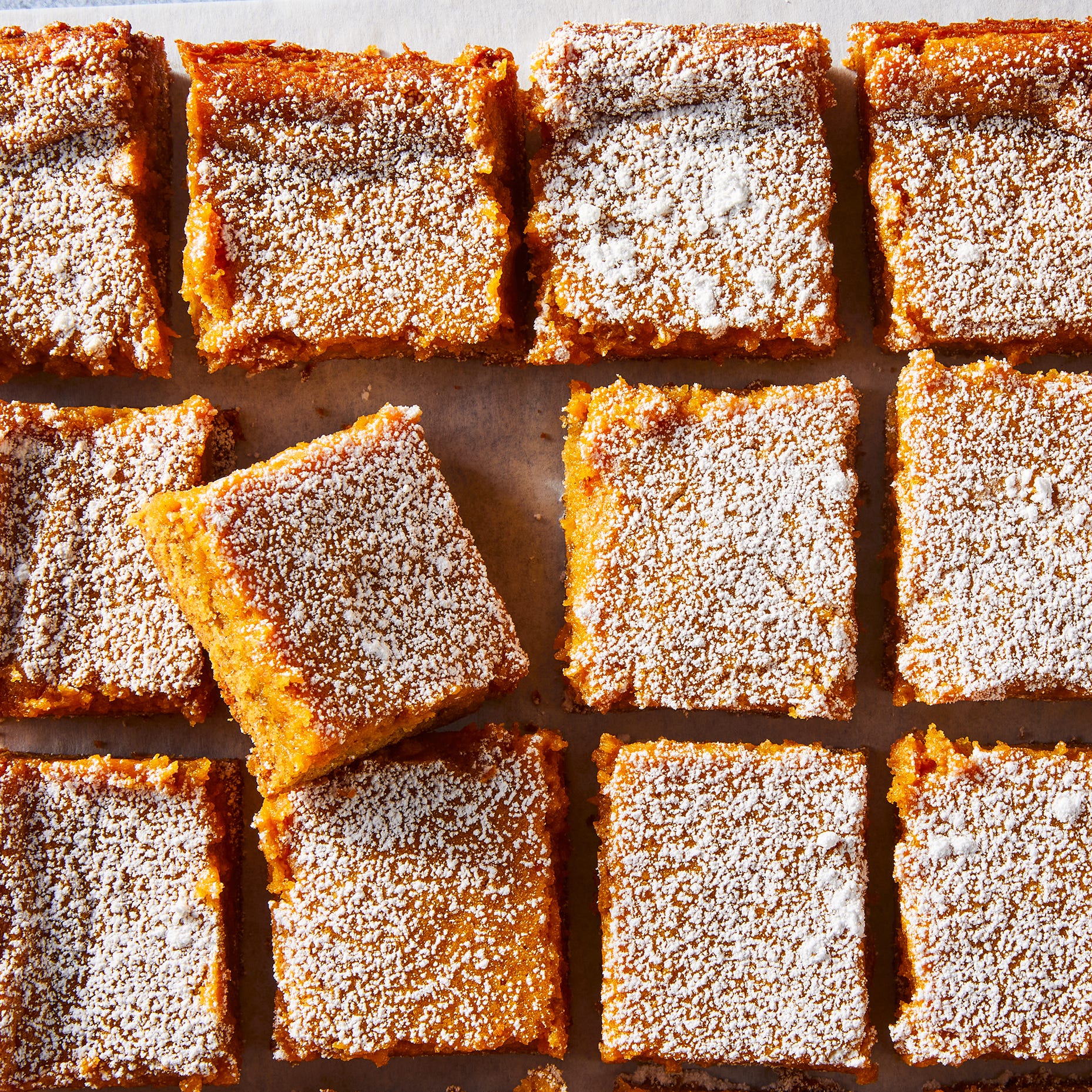 pumpkin bars topped with powdered sugar