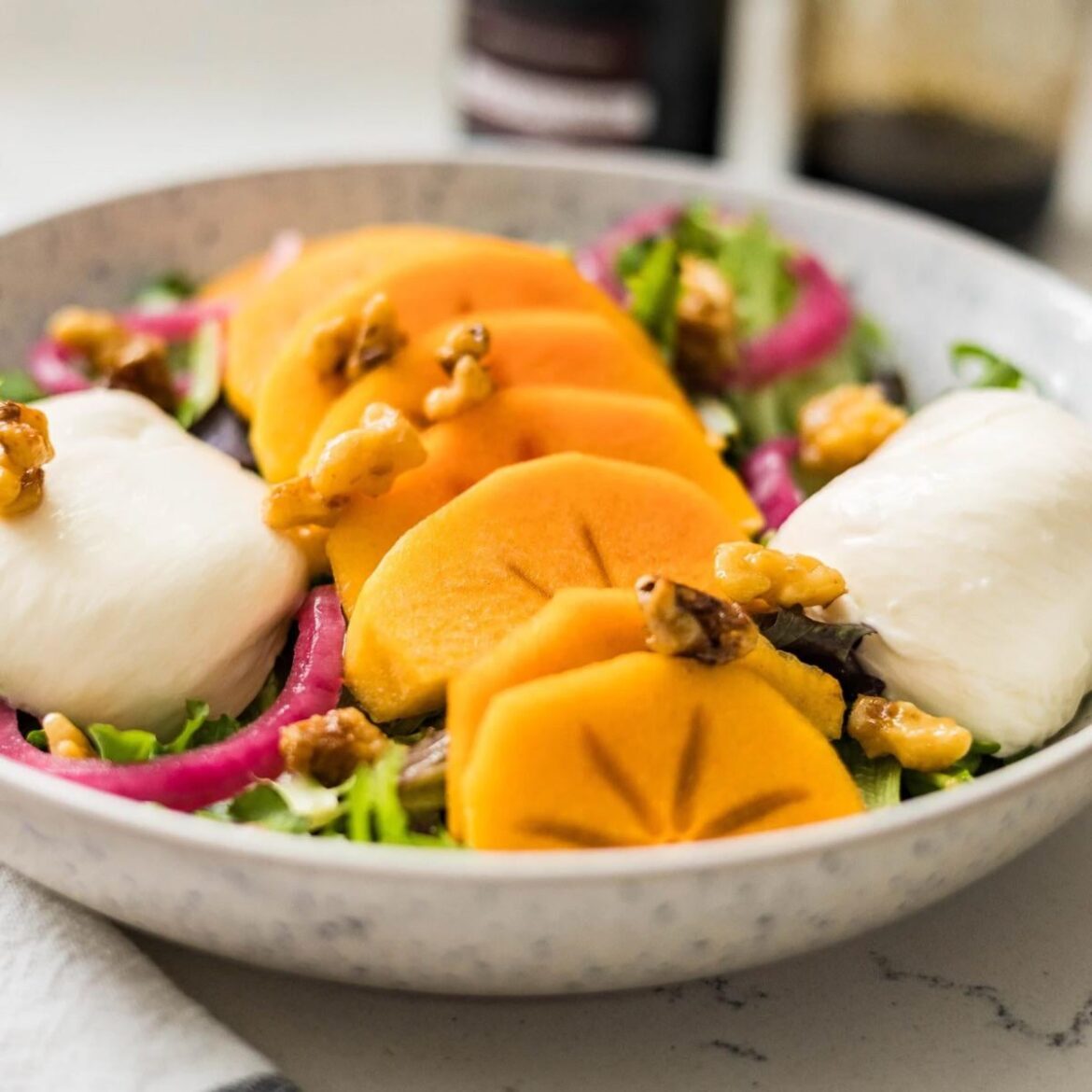 Persimmon and burrata with a bit of salad 😆