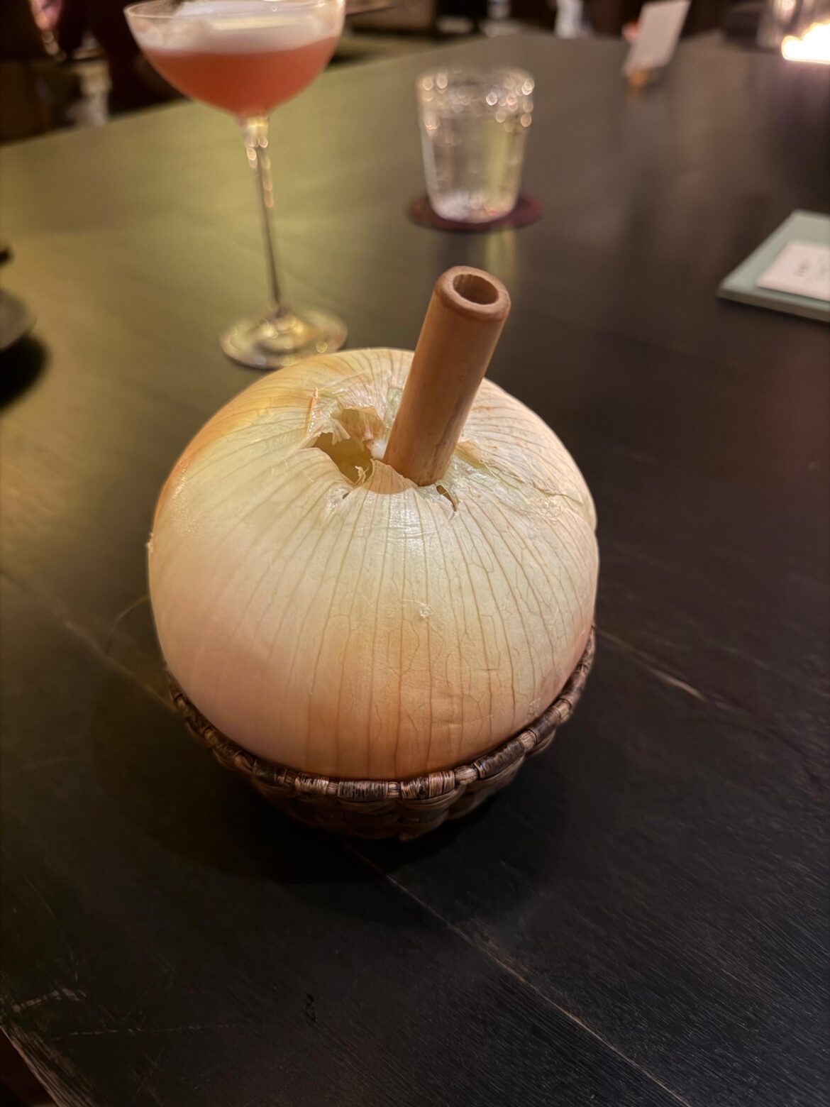 Onion soup served in an onion in a NYC fine dining restaurant