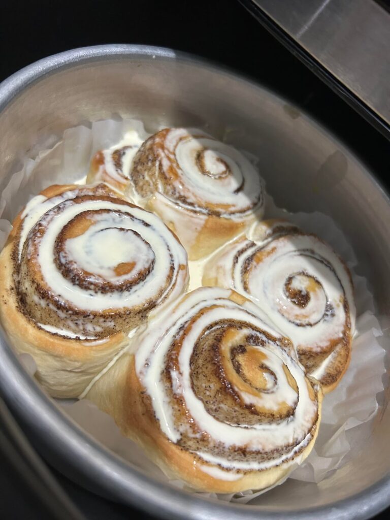 Homemade cinnamon rolls fresh out of the oven. What’s your icing level: drizzle, flood, or avalanche?