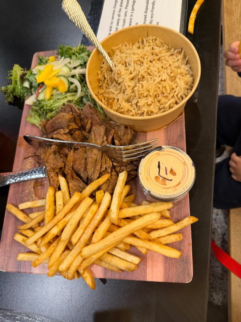 At least the rice was in a bowl my salad and fries spilled over to the table