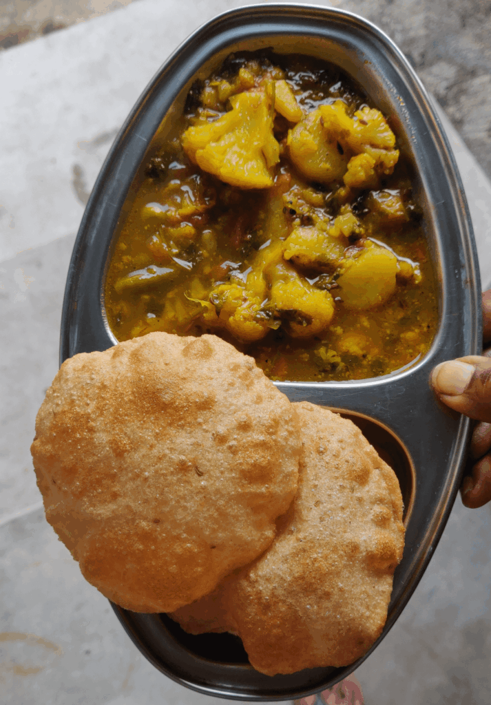 Recipe for homestyle aloo gobhi ki sabji (potato cauliflower curry) and poori (deep fried indian bread)