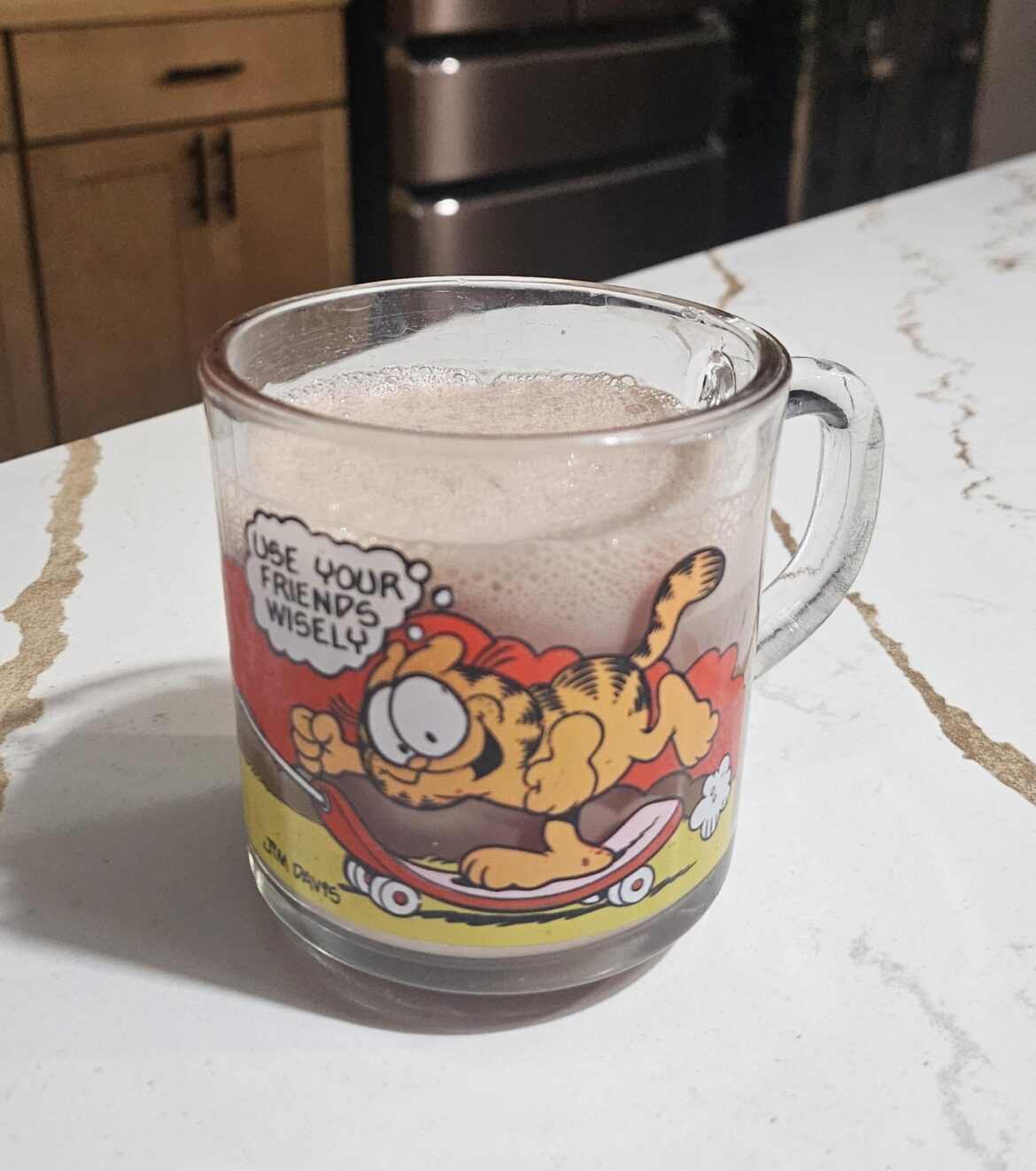 Store brand chocolate milk in my 1978 Garfield mug. I'm 45.