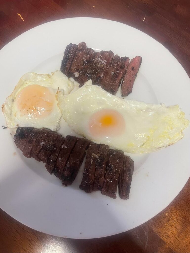 Skirt steak & eggs. And a scramble w/lots of cheese from the broken egg.