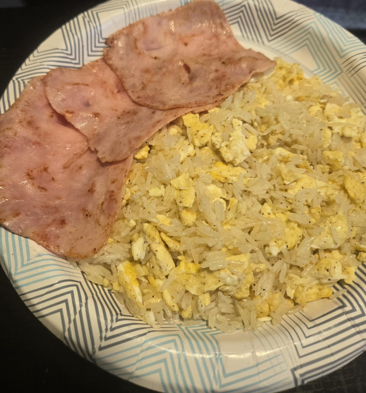439 calories, lean ham slices, 1 egg and 2 egg whites, low calorie butter, 1.25 serving of rice