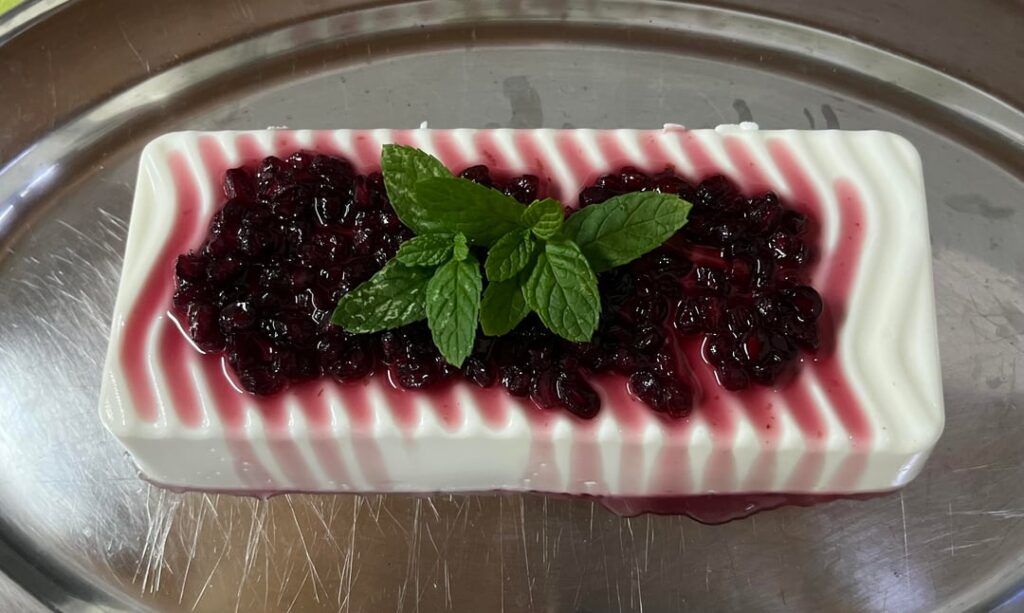 Pannacotta and pomegranate jam on top