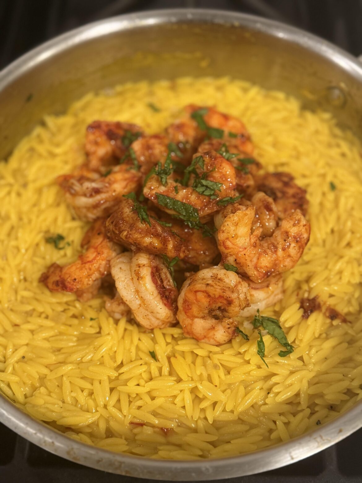 Creamy saffron orzo with spiced butter, garlic shrimp