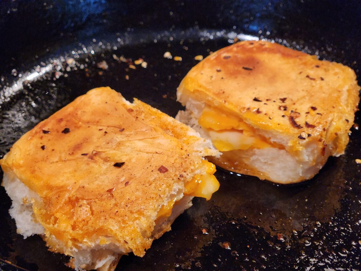 Hawaiian roll with Colby jack, grilled in truffle oil chili crisp.
