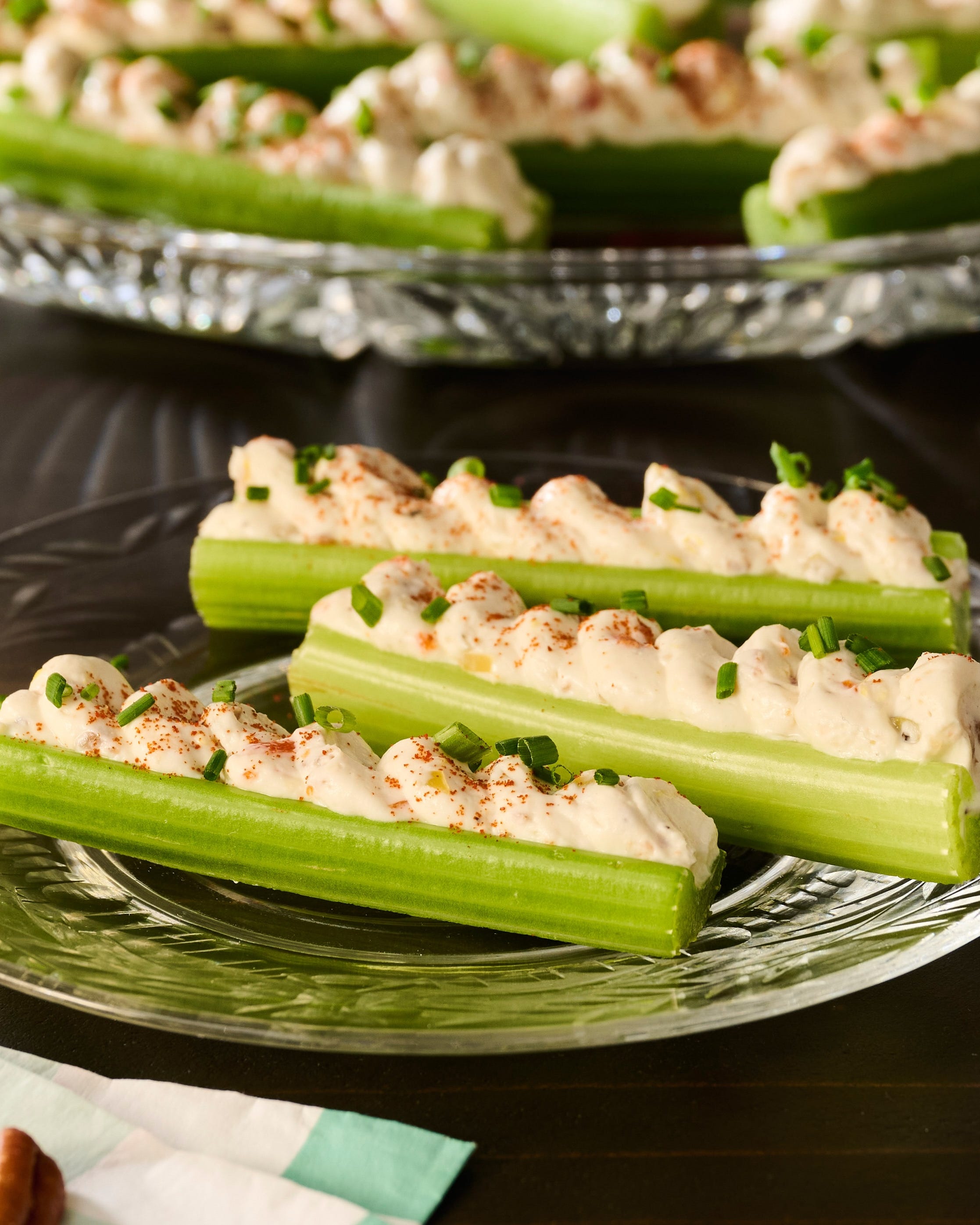 celery sticks filled with a creamy mixture and garnished