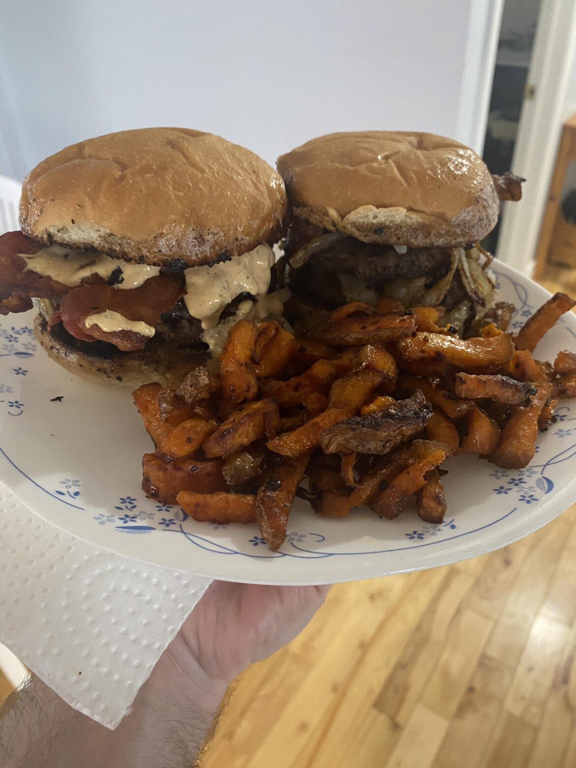 Bacon and onion smash burgers with smoked cheddar and sweet potato fries. Not the prettiest but they’re good.