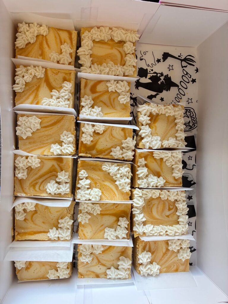 I made pumpkin swirl cheesecake bars as a treat for my tattoo artist’s shop