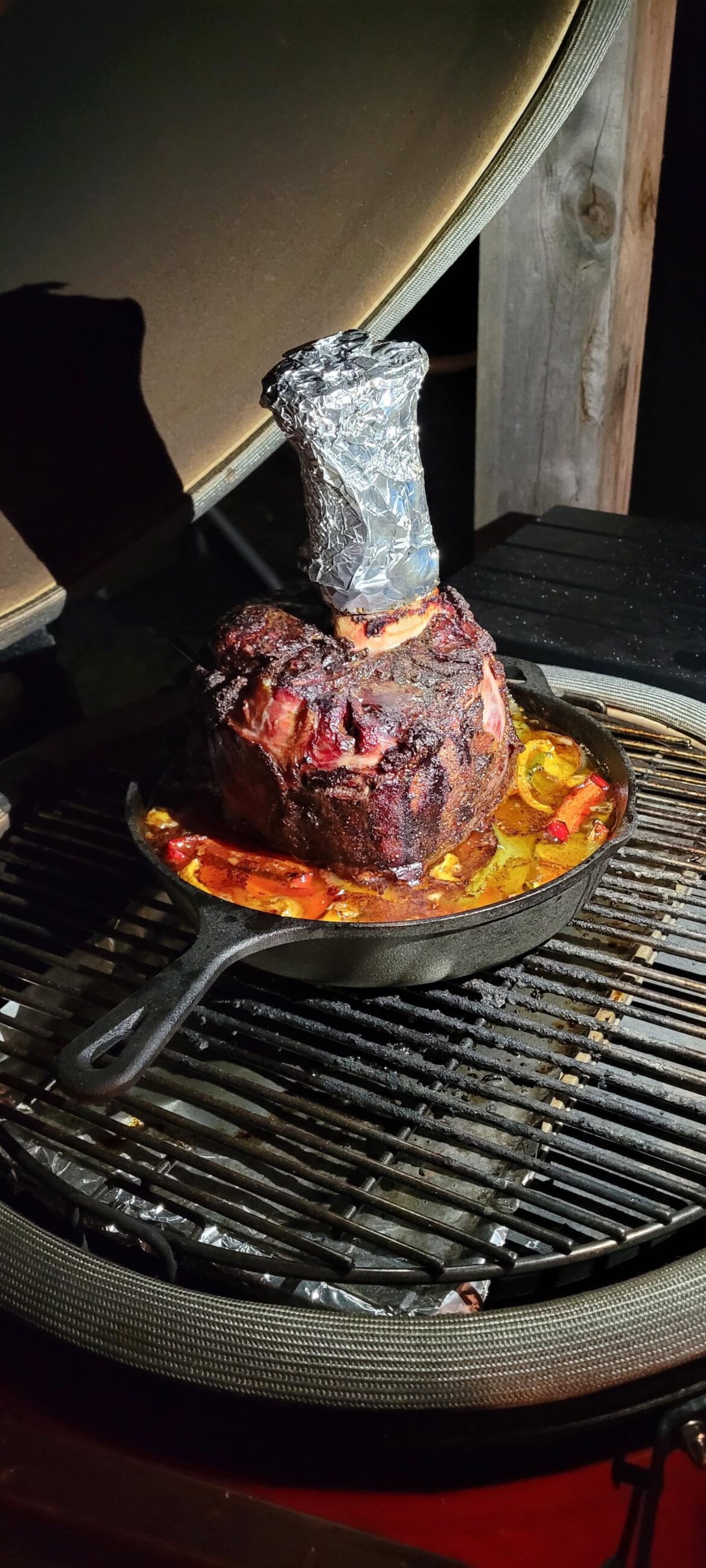 Thor's Hammer. 9hrs in the Kamado...5 hrs on the grill, 4 hrs in the liquid (Beef Talow and water) with peppers and onions