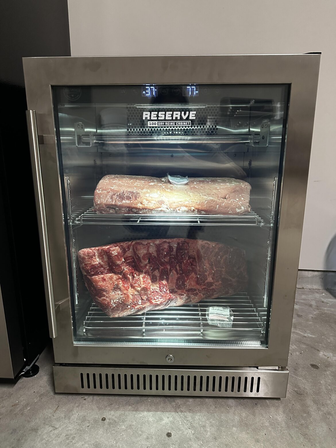 Costco haul. 23lb Whole USDA Prime ribeye and 16lb Prime NY loin straight into the dry-ager. Day 5. Costco meat never disappoints.