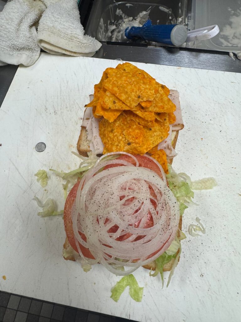 Turkey, provolone, nacho cheese Doritos, mustard, LTO, s&p on white bread