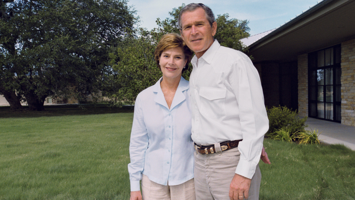 A photo of President George W. Bush and Mrs. Laura Bush outside of their Crawford, Texas ranch