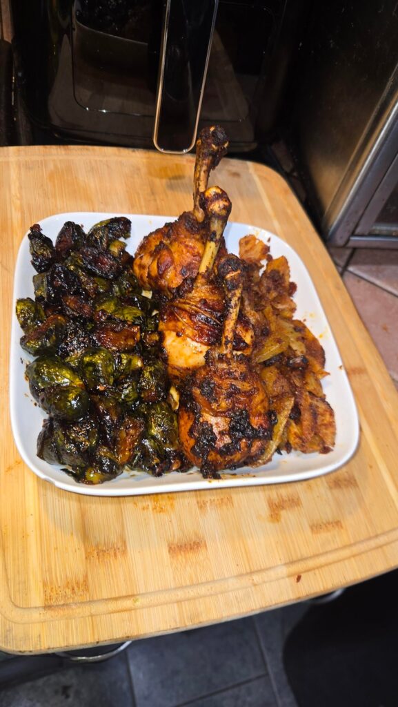 Made my fiancé’s comfort meal tonight — her comfort food of sweet, spicy, and savory. Charred Brussels sprouts tossed in sweet chili + gochujang. Air fried potatoes with Cajun seasoning. Chicken lolipops, seasoned with sweet chili, gochujang, bacon oil, butter, red pepper, paprika, onion and garlic.