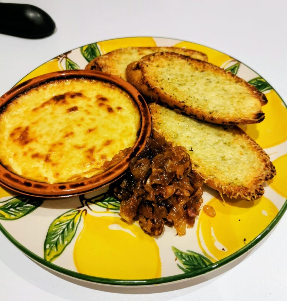 Mature Cheddar Cheese Bake With Hint Of Mustard and Garlic, Caramelised Onions & Crusty Cheesy Baguette Slices