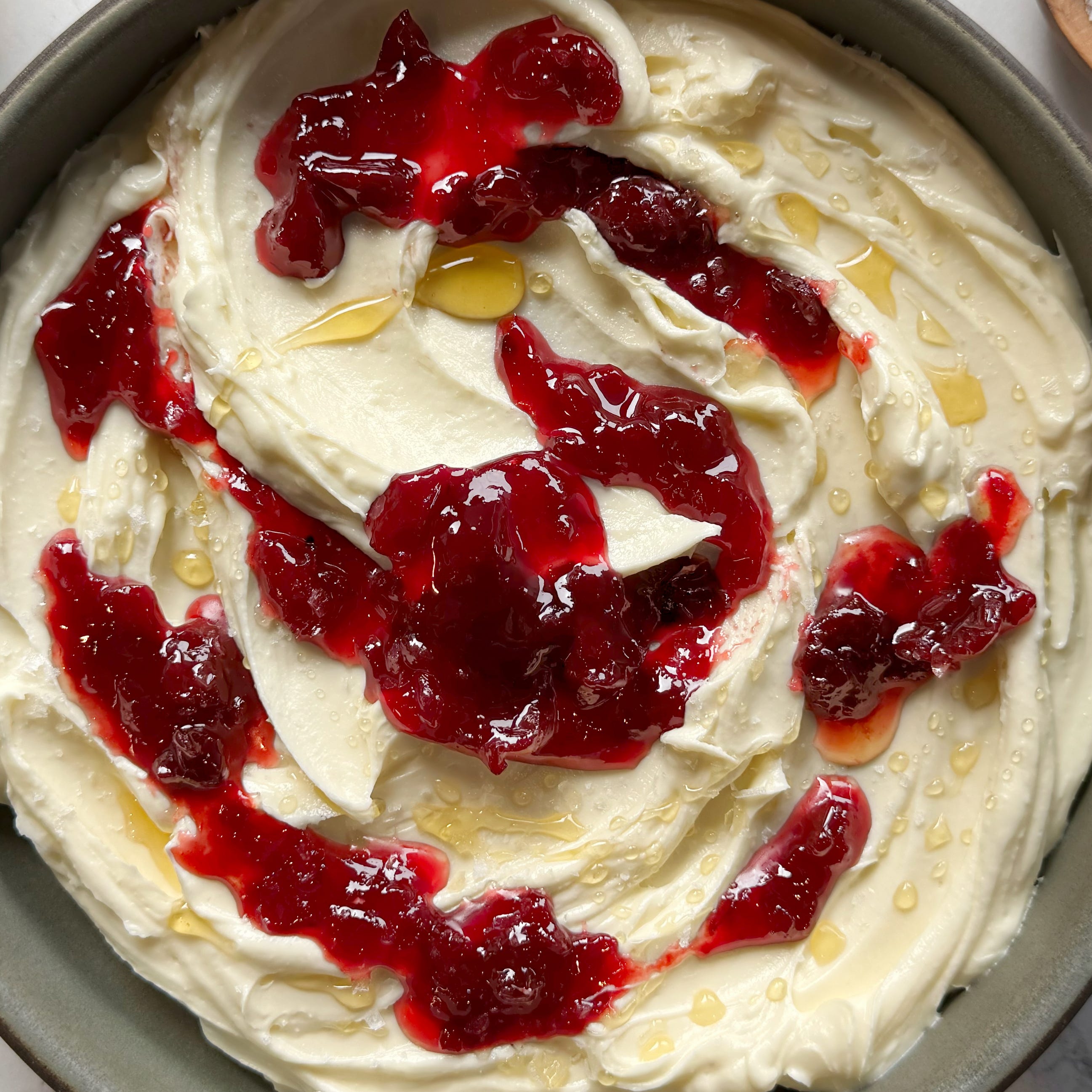 whipped brie topped with honey and fruit preserves