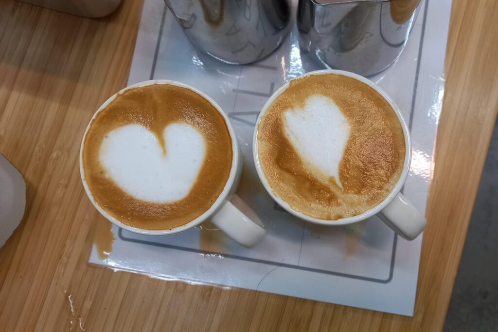 my first latte art vs my latest latte art