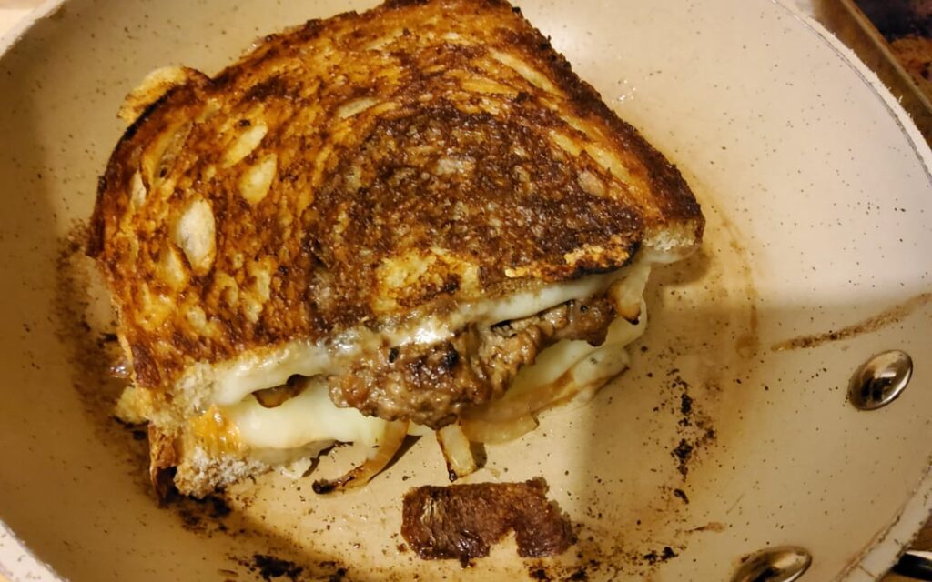 No buns, so I made a patty melt on rye marble, Swiss cheese, and grilled onions.
