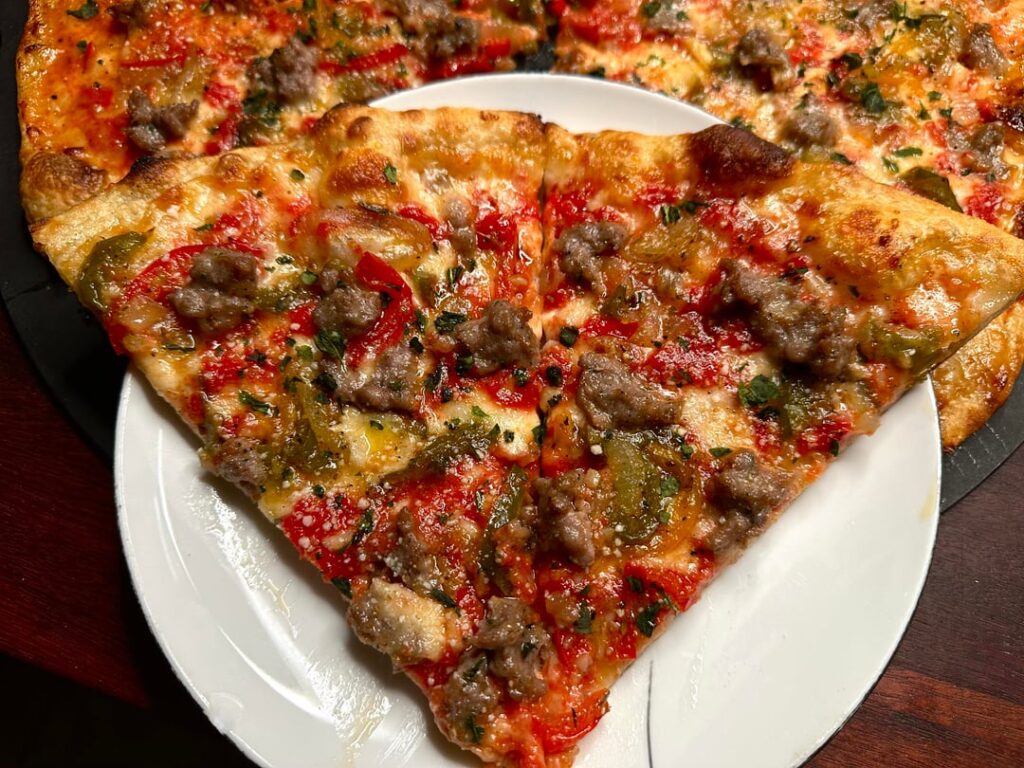 [Homemade] sausage, peppers, and onions pizza.