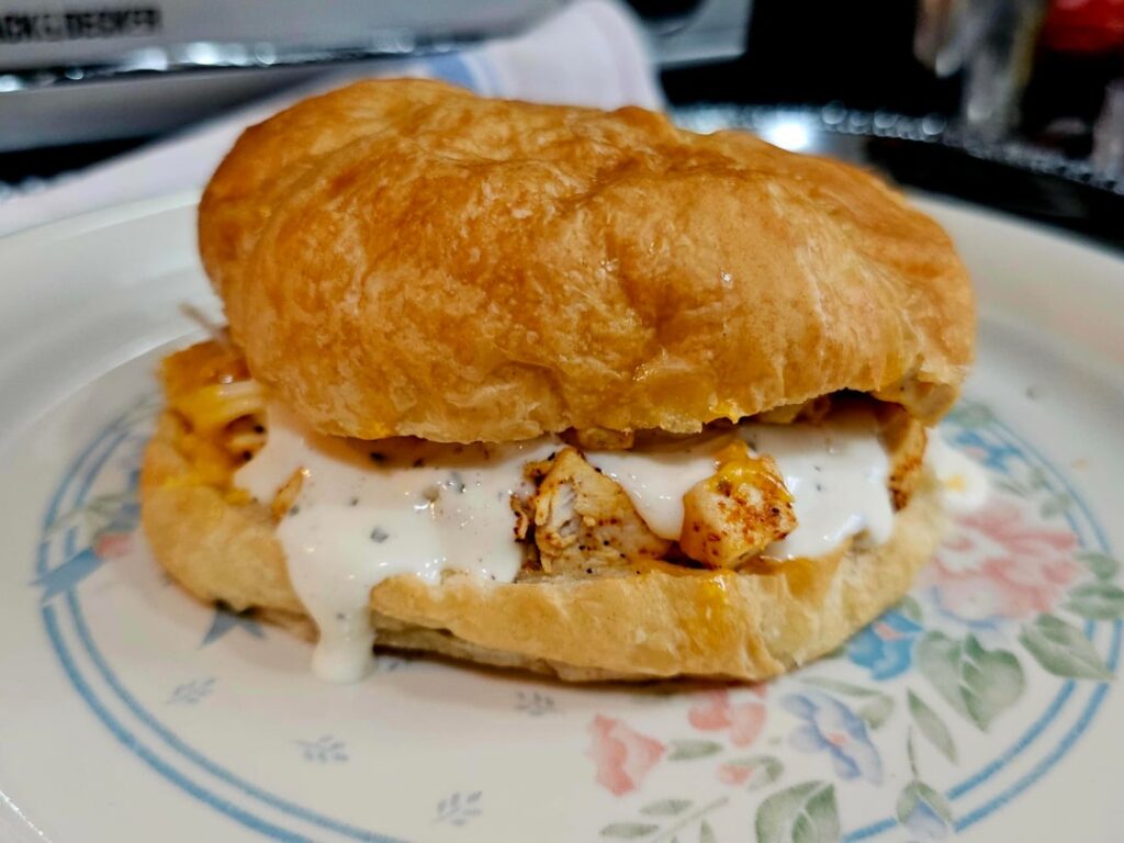 Spicy chicken on croissant