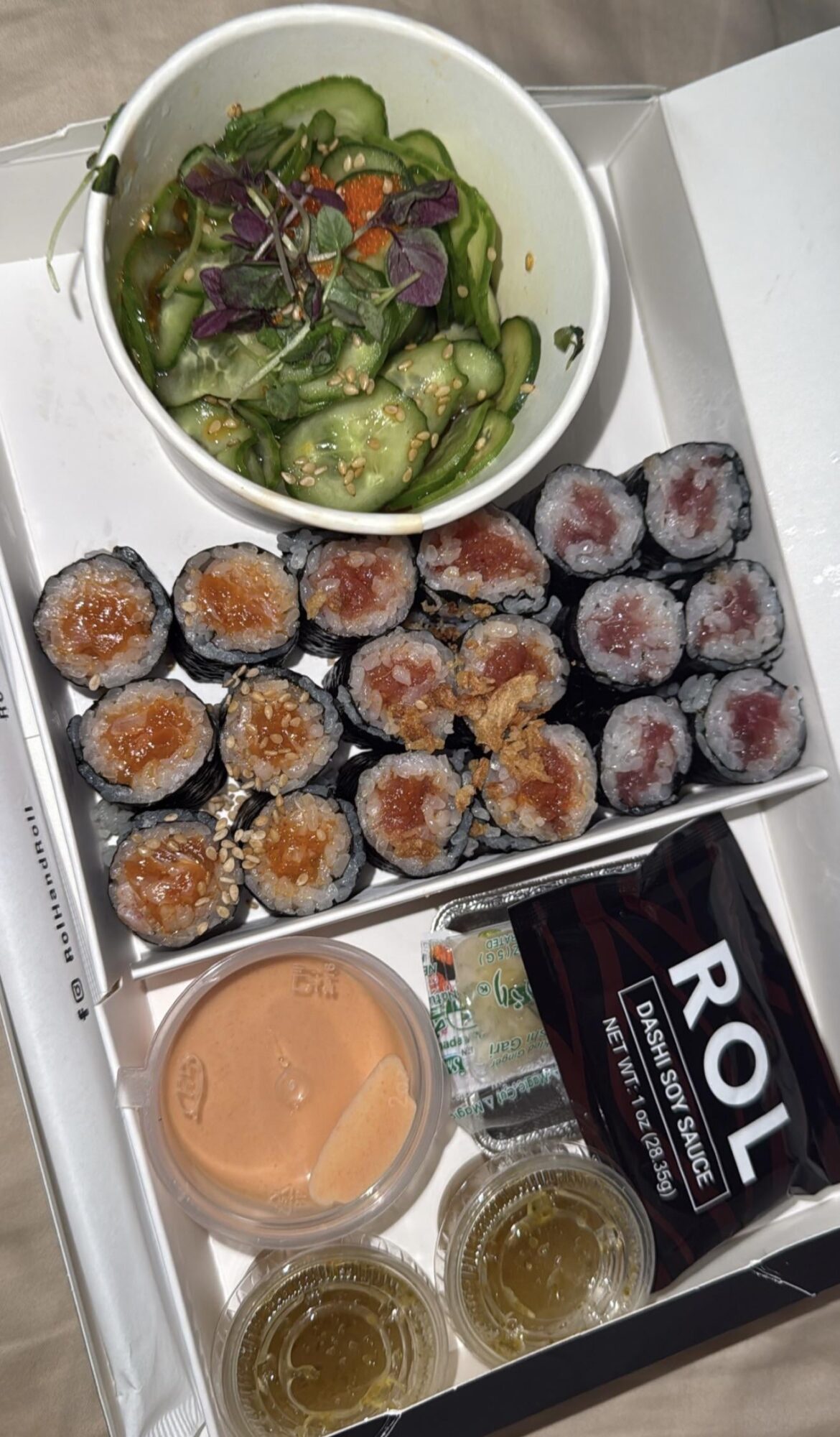 Spicy salmon, spicy tuna, and tuna roll