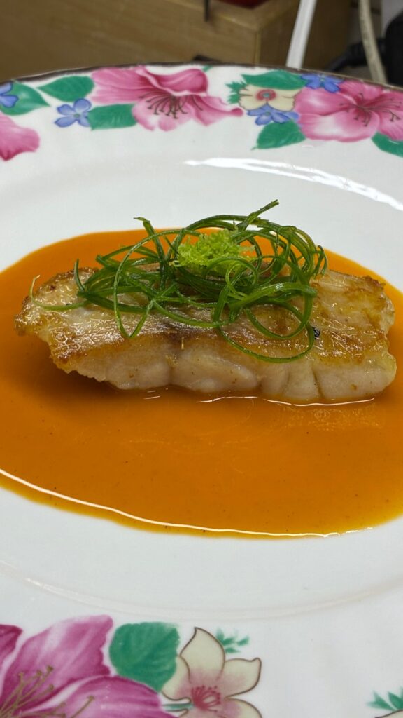 Pan seared grouper, bisque sauce, garlic foam