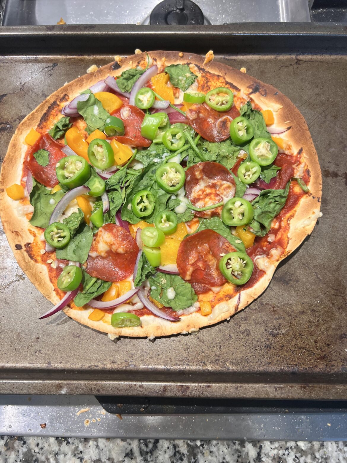 Low carb (carb balance tortilla)  pizza with turkey pepperoni EXTRA spicy!
