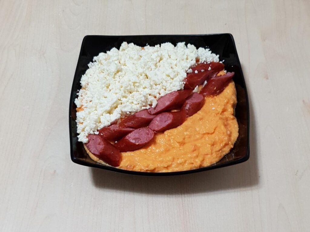 Mashed sweet potatoes with butter and garlic infused sour cream, sausages and telemea (sheep cheese)