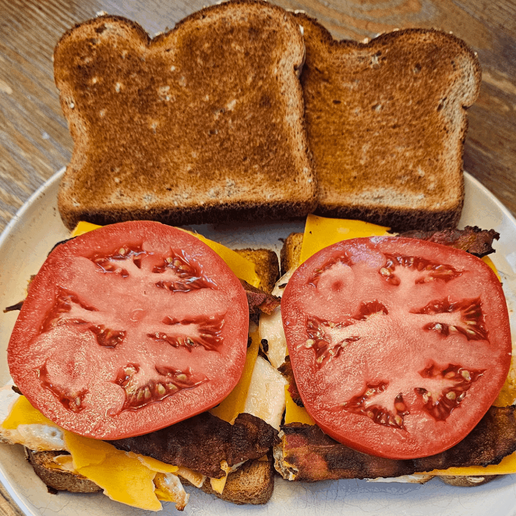 Bacon, egg, cheese, and tomato on whole wheat. My breakfast this week.