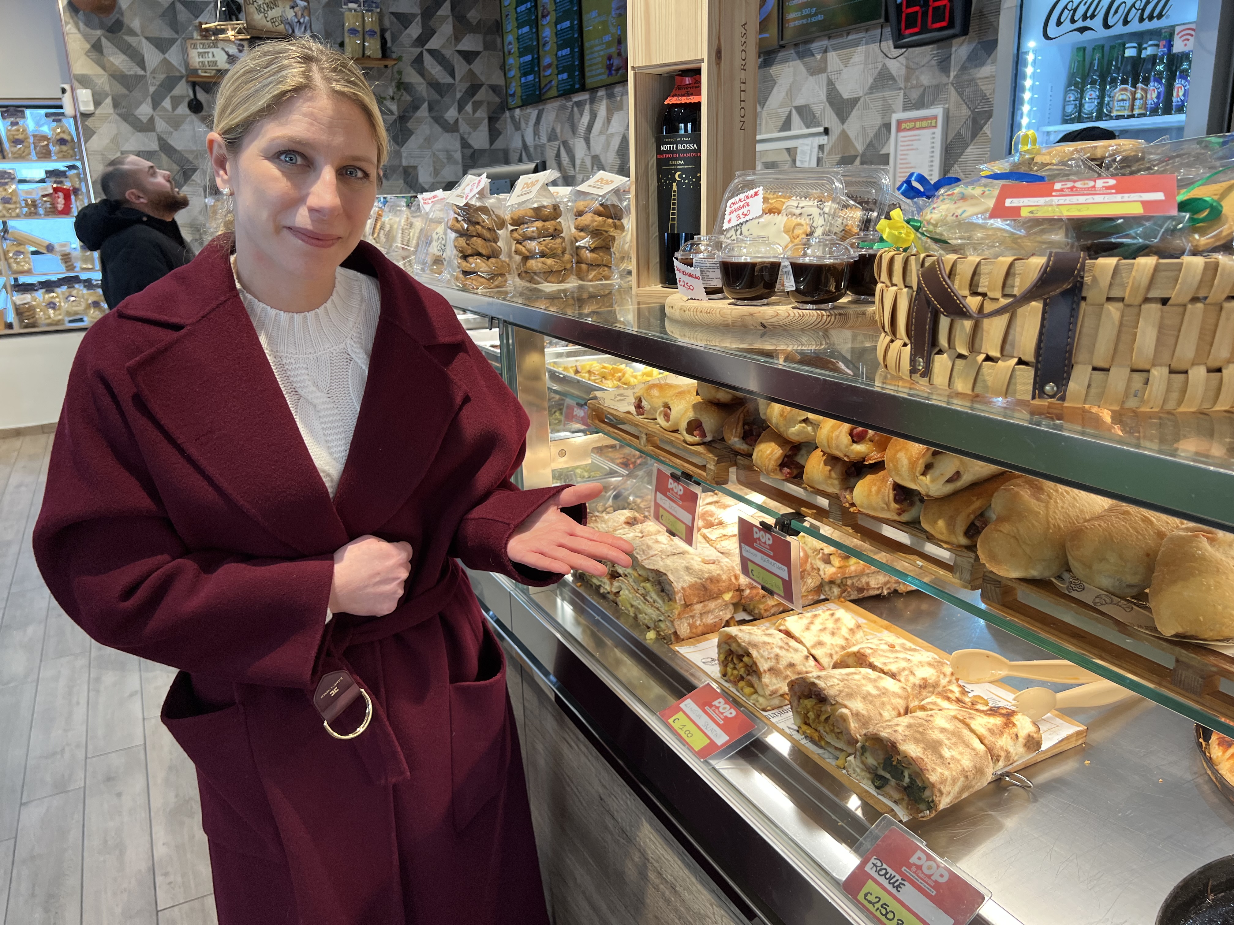 Dr. Sonia Chiappetta inspecting food in a Ponticelli eatery.