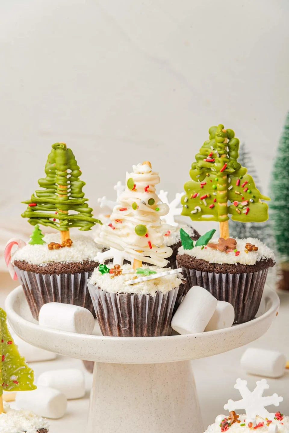 A close up shot christmas tree cupcakes.
