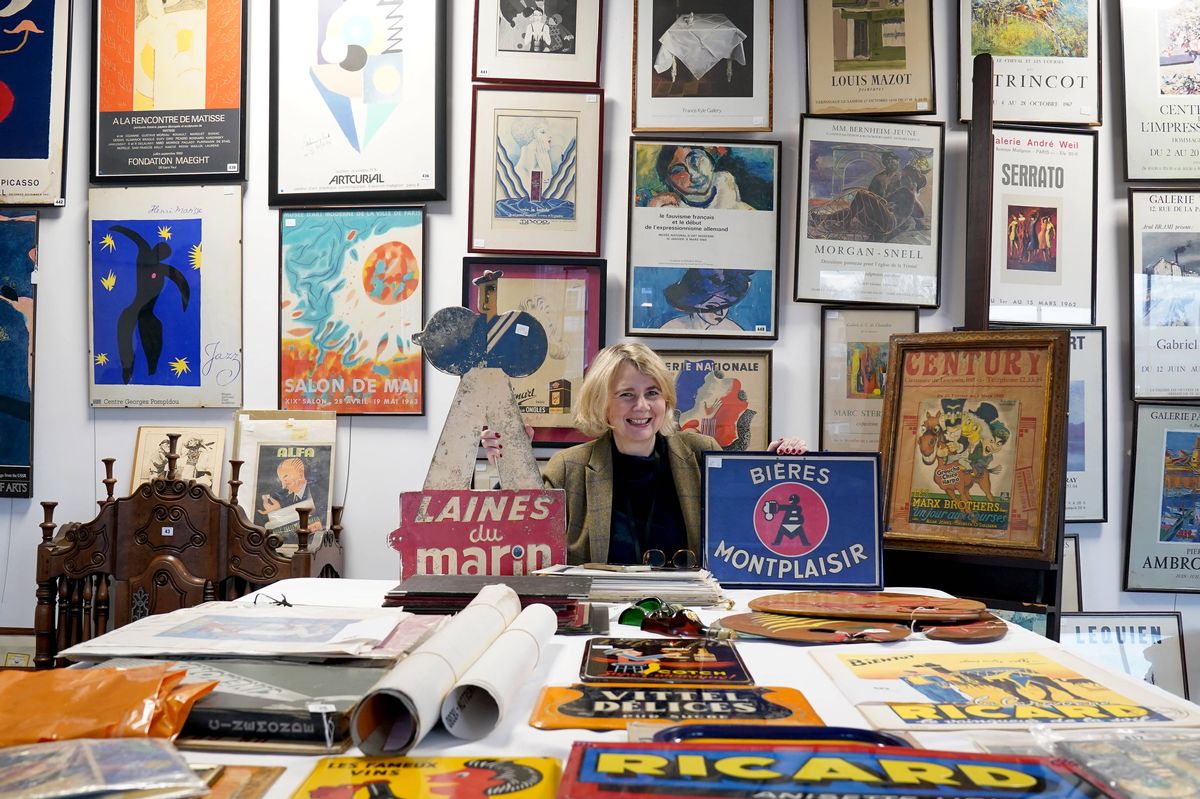 Catherine Southon of Catherine Southon Auctioneer's in Chislehurst, Kent, amongst items from London's oldest family run French restaurant, Mon Plaisir, which is auctioning off their classic interior decorations to make way for a new look. Mon Plaisir in Covent Garden, usually adorned with a large tricolour flag, has served up "great food" and "rude" waitstaff for over 80 years. Picture date: Monday December 22, 2025.