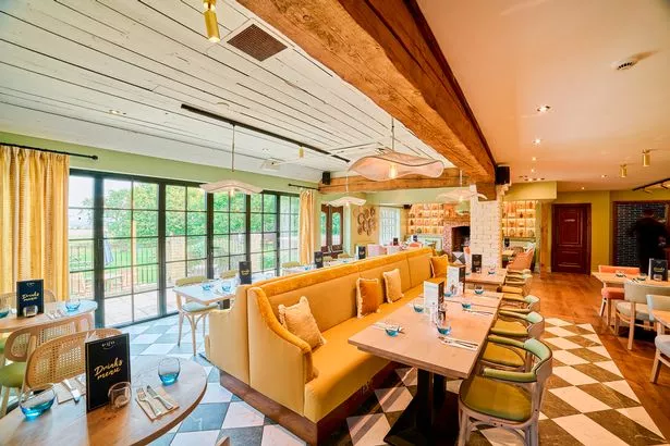 The interior blends rustic Mediterranean styles with contemporary décor