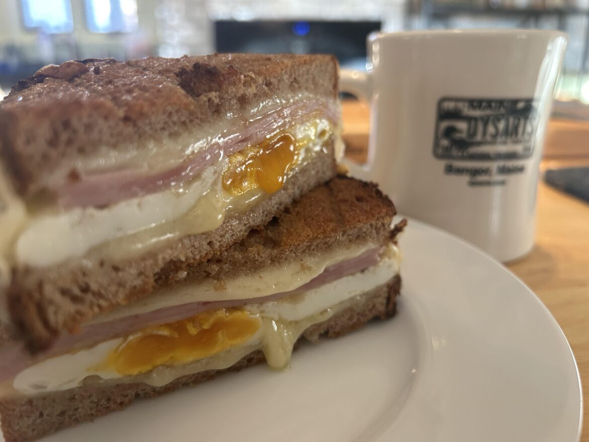 Ham, egg, cheddar, and Swiss on wheat