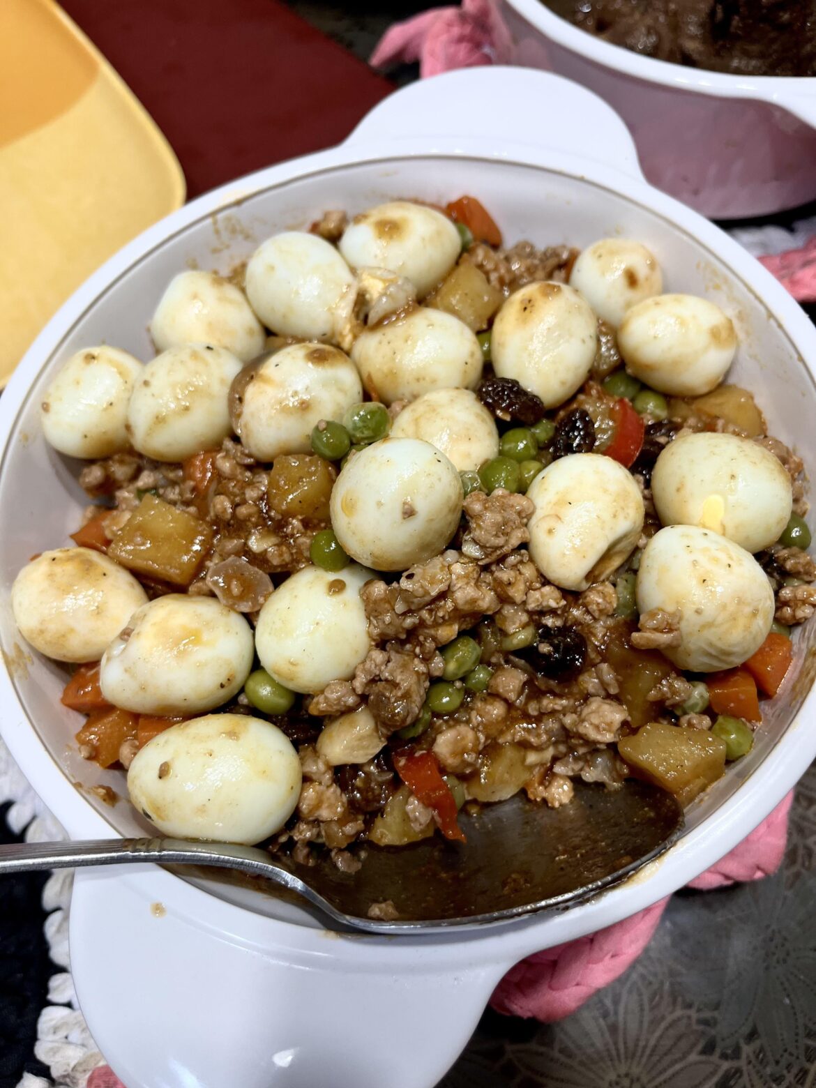 Pork Picadillo with qual eggs.