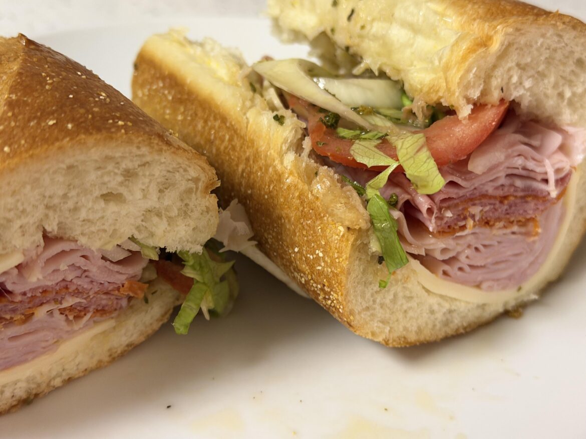 Ham, salami, pepperoni, cheese, onion, lettuce, tomato, oil & vinegar.