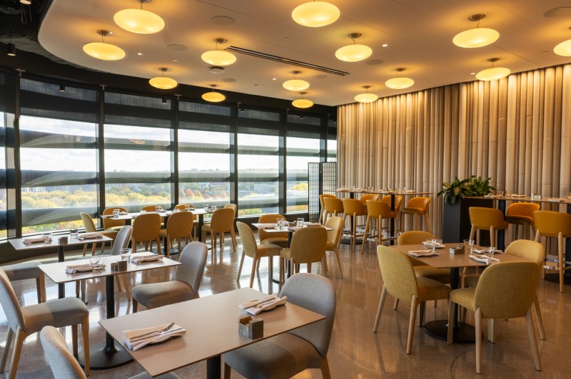 A view of the dining room atop the EXP complex without diners, with a sweeping view of the campus environment.
