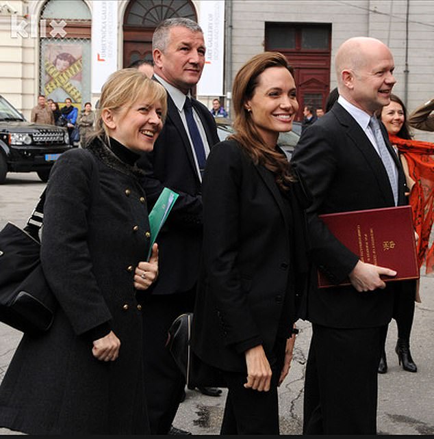 Jolie and Helic (left) grew close in 2012 after she teamed up with his then-boss, former UK foreign secretary William Hague (right), on an anti–sexual violence campaign