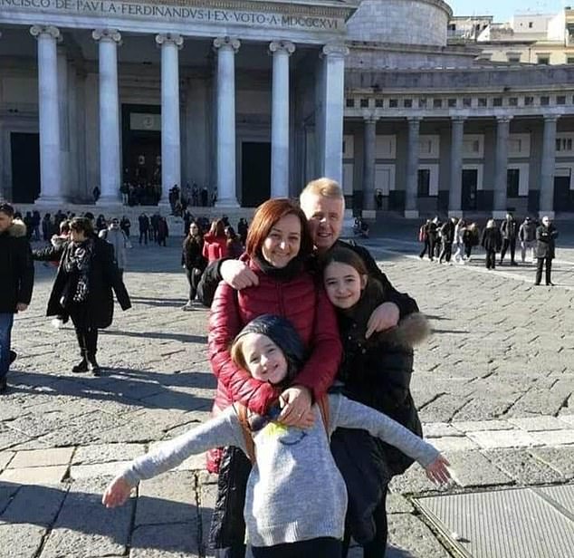 Antonella Di Ielsi, 50, pictured with husband Gianni and their two daughters (Sara in centre)