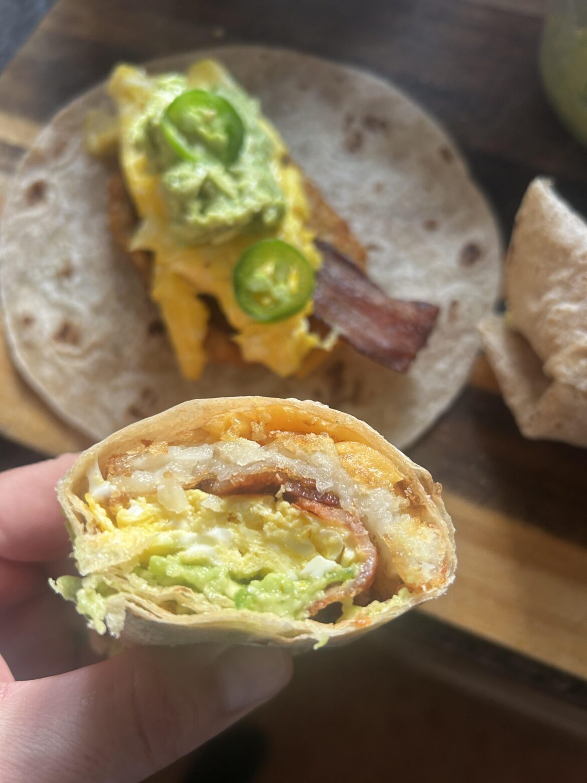 My go to breakfast wrap, bacon, egg, cheddar, hash brown, avocado and jalapeño.