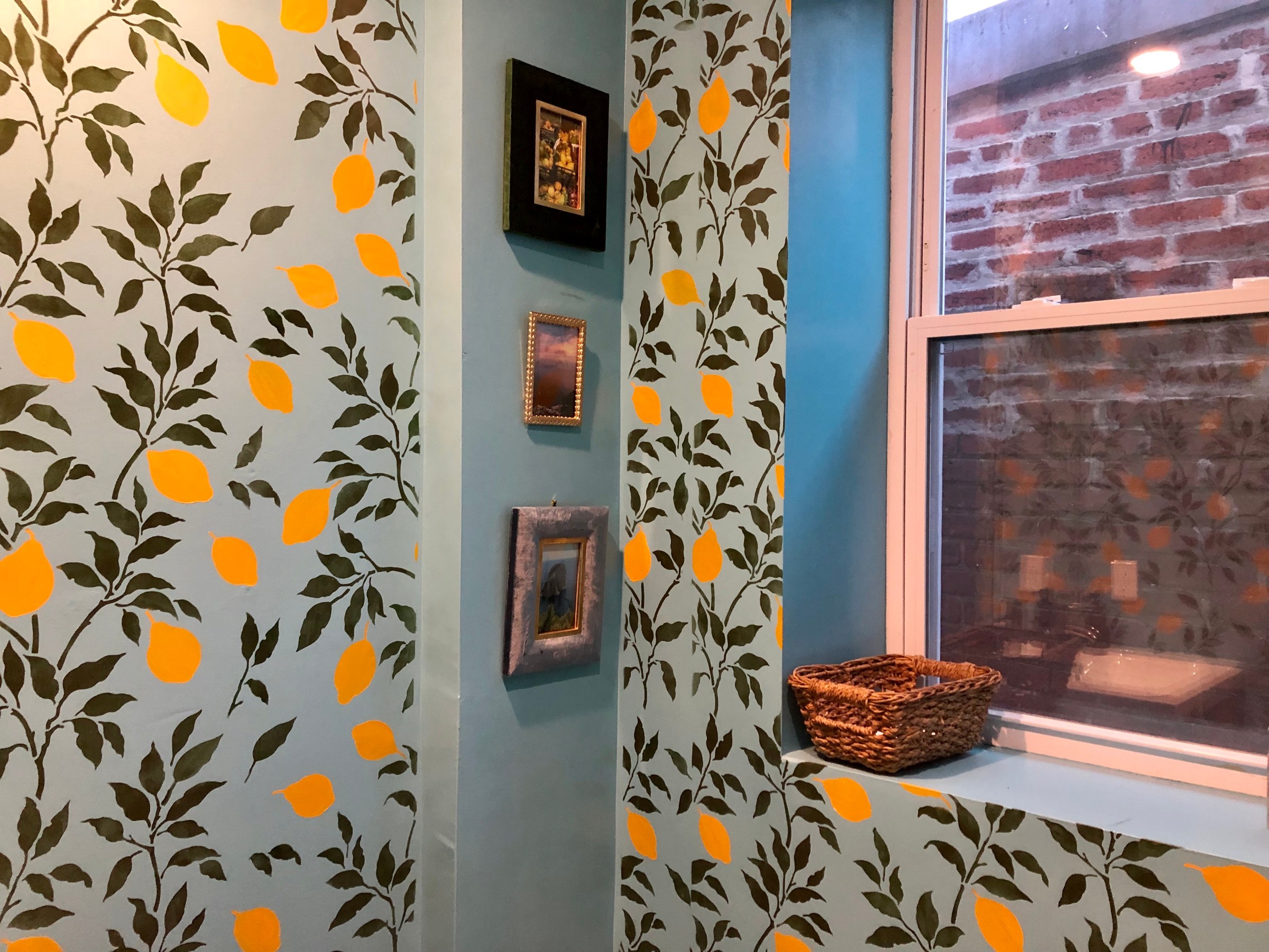 The upstairs bathroom got a lemon grove-themed refresh.